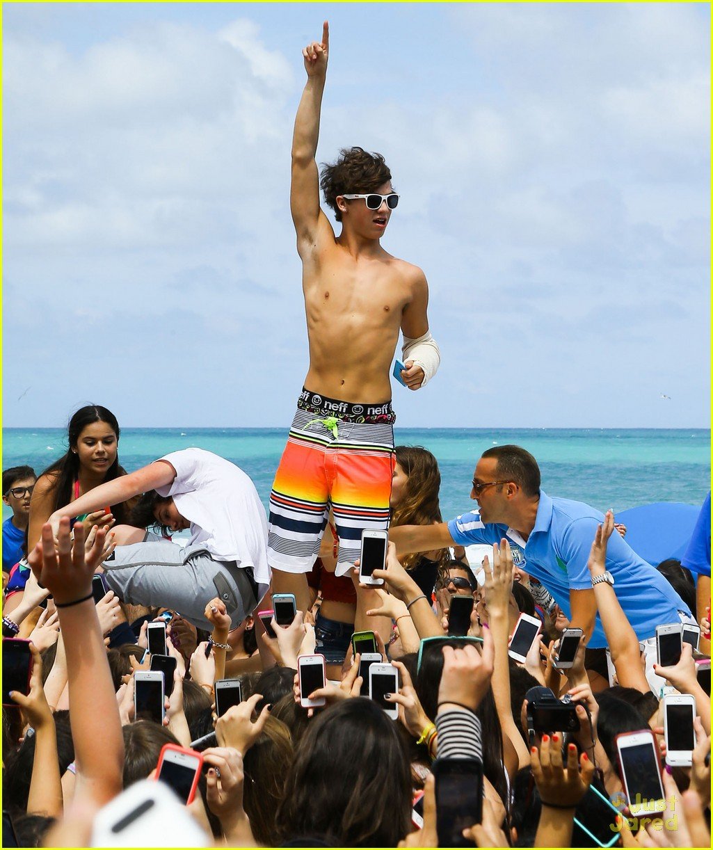 Cameron Dallas Splashes Around Shirtless In Miami Photo