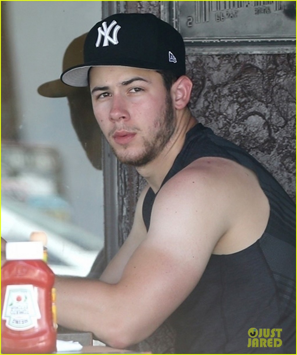 Full Sized Photo Of Nick Jonas Bares Buff Biceps Farmers Tan After A