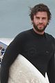 liam hemsworth hits the waves with brother luke 05