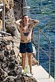 harry styles showers shirtless in italy 01