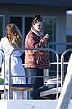 selena gomez boards a yacht for quick trip with friends 05