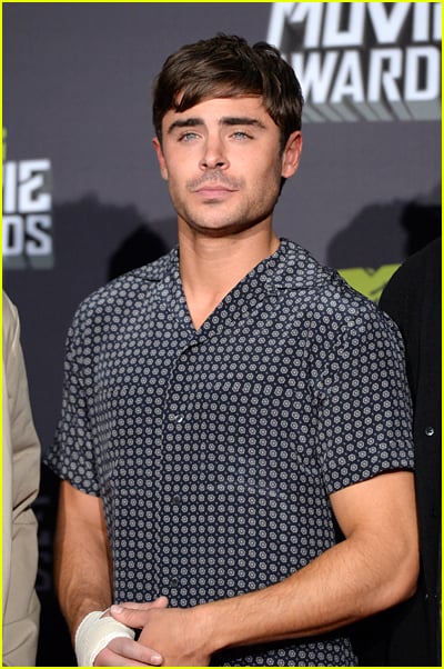 Zac Efron has a bandage on his hand