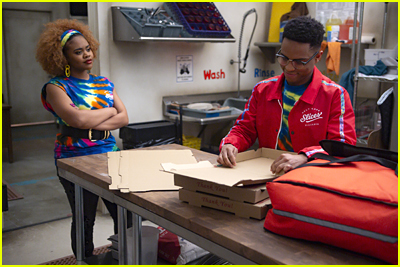 Dara Renee and Roman Banks in the pizza shop on HSMTMTS