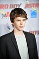 LOS ANGELES, CA. October 19, 2009: Freddie Highmore with Astro Boy  character at the Los Angeles