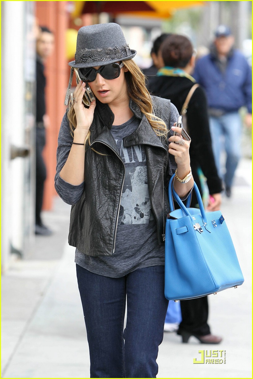 Ashley Tisdale Sky Blue Hermes Birkin with ripped white jeans and