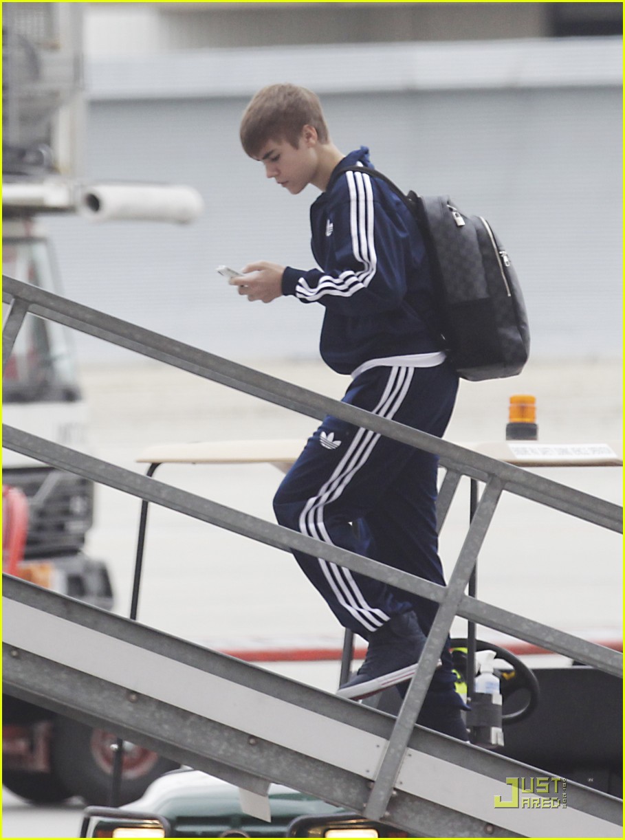 Justin Bieber wearing Louis Vuitton Backpack