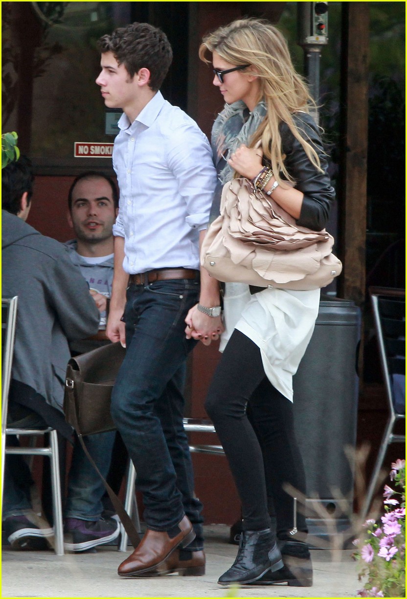 Nick Jonas & Delta Goodrem: Holding Hands At Henry's Hat 