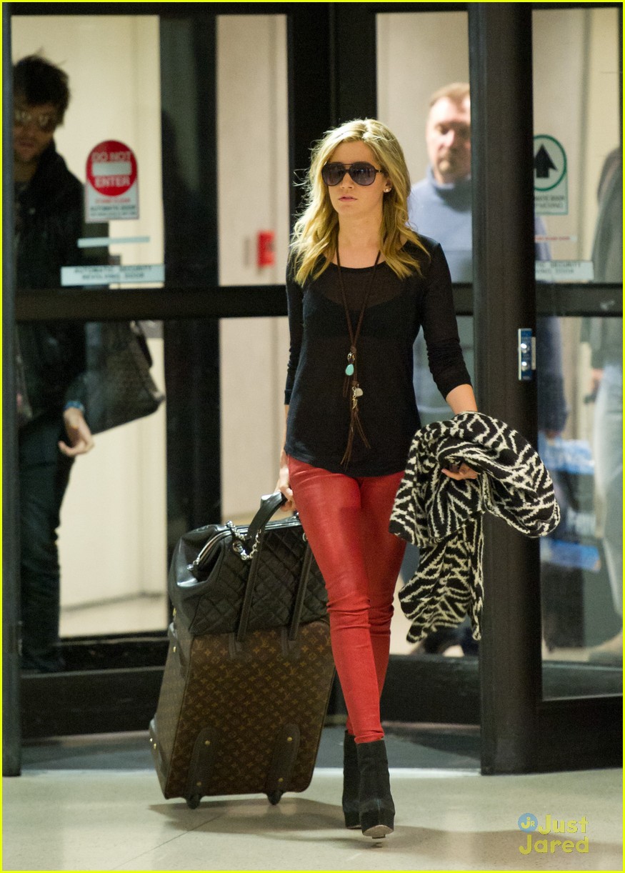Full Sized Photo of ashley tisdale martin lax arrival 04 | Ashley