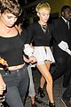 miley cyrus holds hands with nicole schzeringer london 07