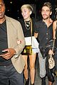 miley cyrus holds hands with nicole schzeringer london 11