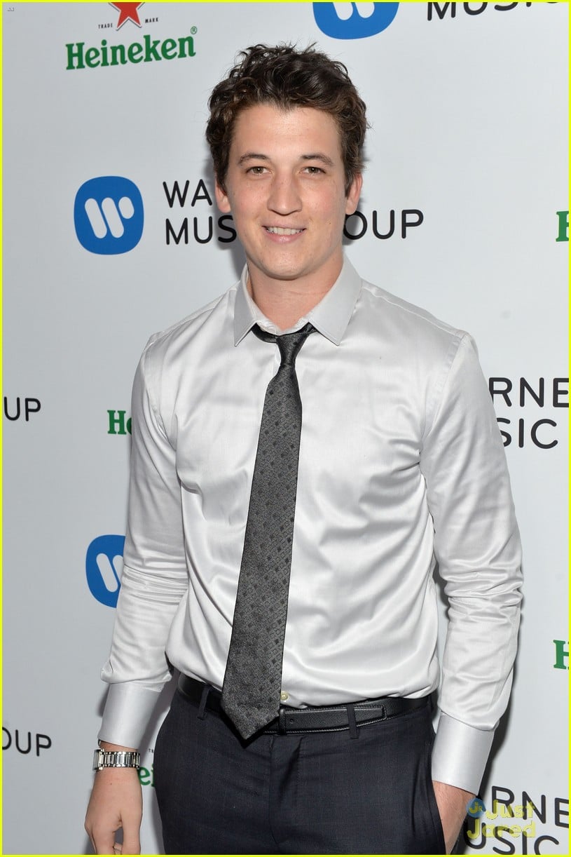 Full Sized Photo of miles teller arielle kebbel warner music group