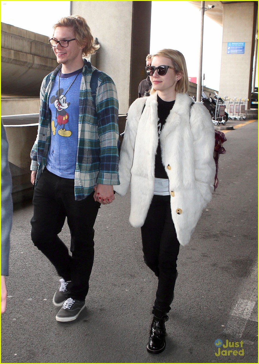 Emma Roberts & Evan Peters Arrive In Paris For Fashion Week 