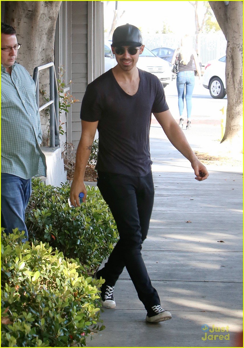 Full Sized Photo of joe jonas leather cap hair appt 03 | Joe Jonas ...