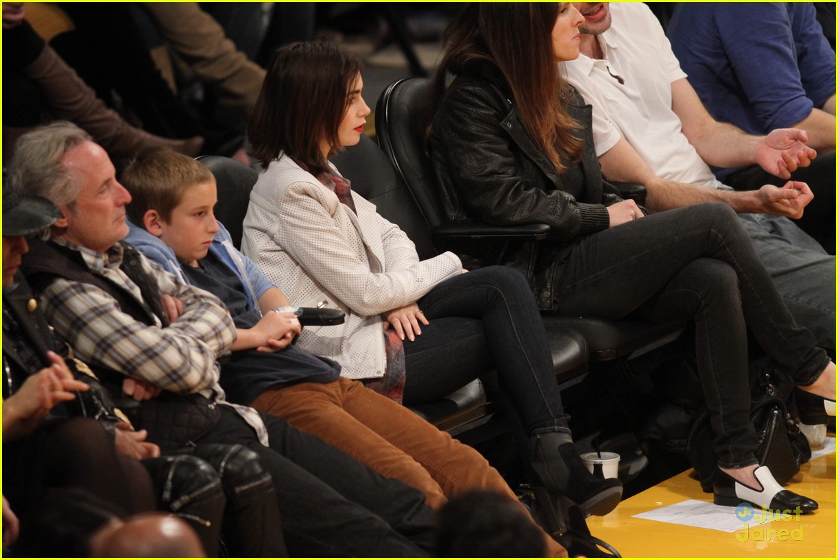 Lily Collins & Boyfriend Thomas Cocquerel Cozy Up Courtside at the