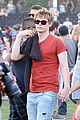 emma roberts and evan peters hold hands at coachella 201405