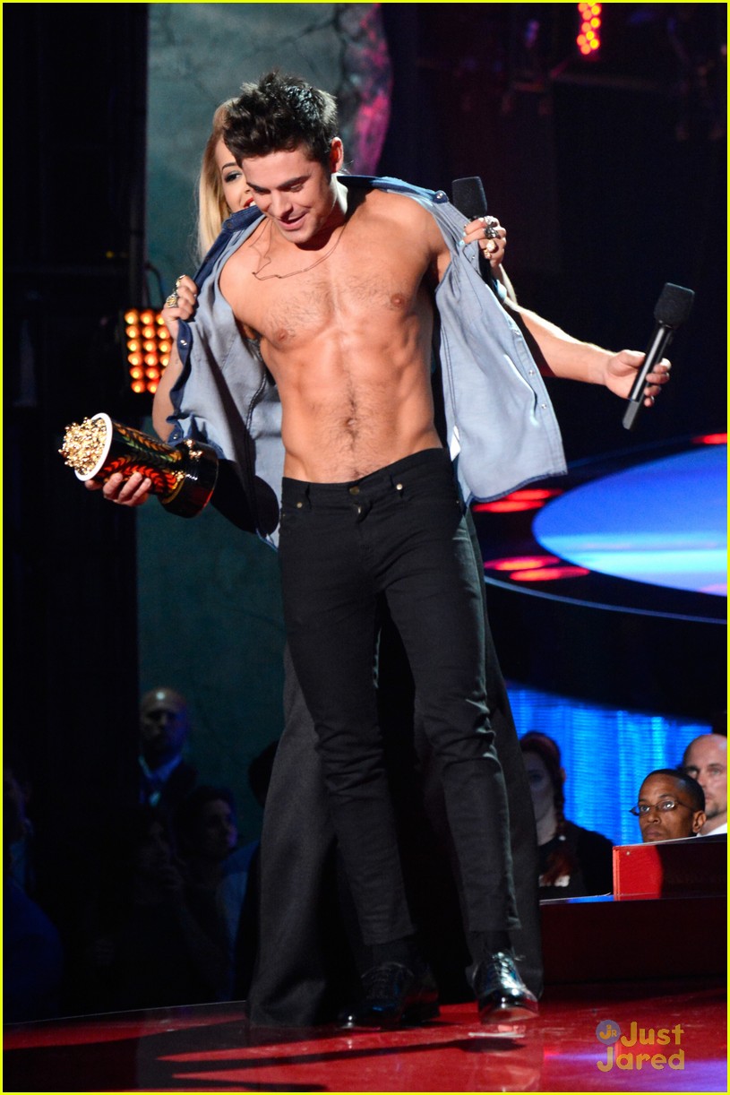 Zac Efron Has His Shirt Ripped Off By Rita Ora At The MTV Movie Awards  (VIDEO, PICTURES)