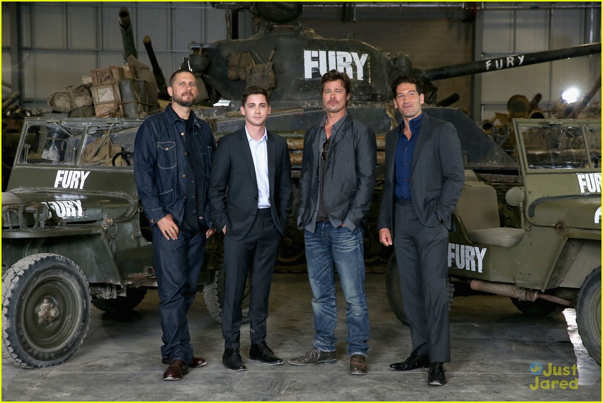 Logan Lerman Promotes 'Fury' with Newly Married Brad Pitt | Photo ...