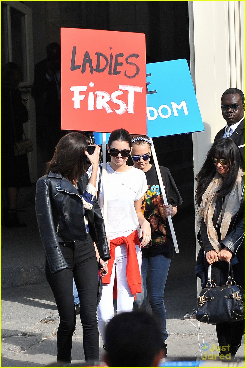 Kendall Jenner And Cara Delevingne Hold Protest Signs After Walking For Karl Lagerfield Photo 