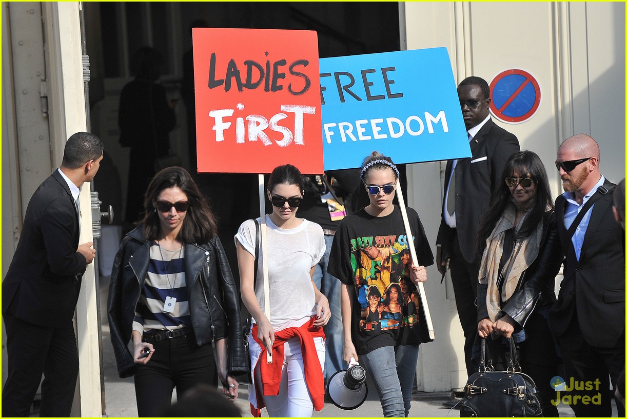 Kendall Jenner And Cara Delevingne Hold Protest Signs After Walking For Karl Lagerfield Photo 