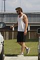 liam hemsworth bares his muscles in a tank top 05