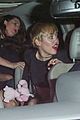 miley cyrus bares her abs for girls night out 16