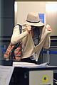 jennifer lawrence touches down at lax after serena 05