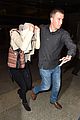 jennifer lawrence touches down at lax after serena 12