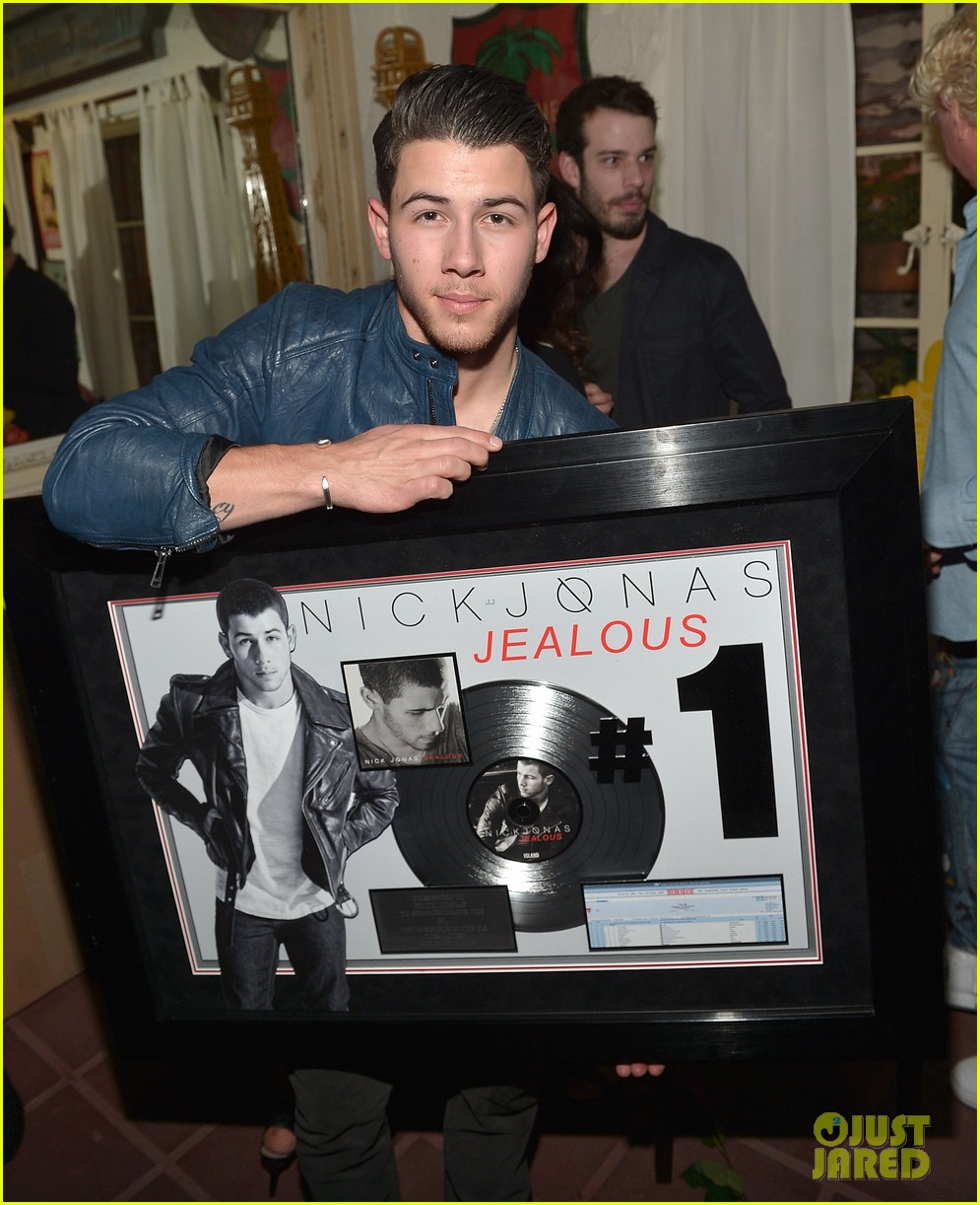 nick jonas celebrates jealous hitting 1 at top 40 radio 27