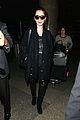 lily collins arrives lax after quick trip 03