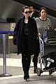 lily collins arrives lax after quick trip 07