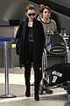 lily collins arrives lax after quick trip 12