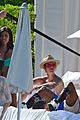 justin bieber relaxes poolside after mens health story 10