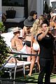justin bieber relaxes poolside after mens health story 12