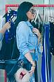 kylie jenner rocks double denim for retail therapy 16