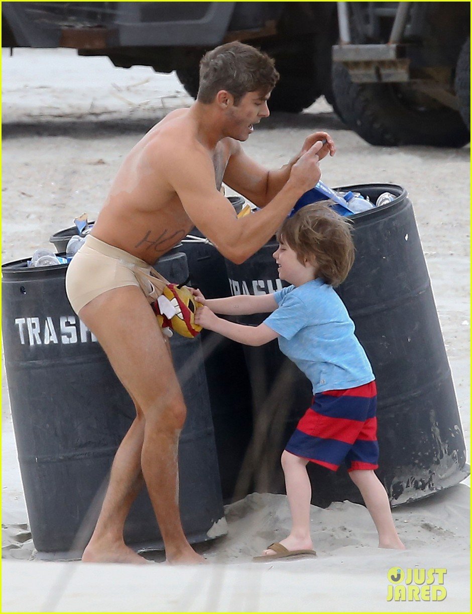 Full Sized Photo Of Zac Efron Shirtless Nearly Naked On Set Zac Efron Runs Around Almost