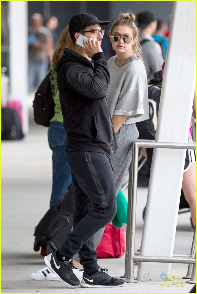 Full Sized Photo of gigi hadid joe jonas arrive jfk together workout