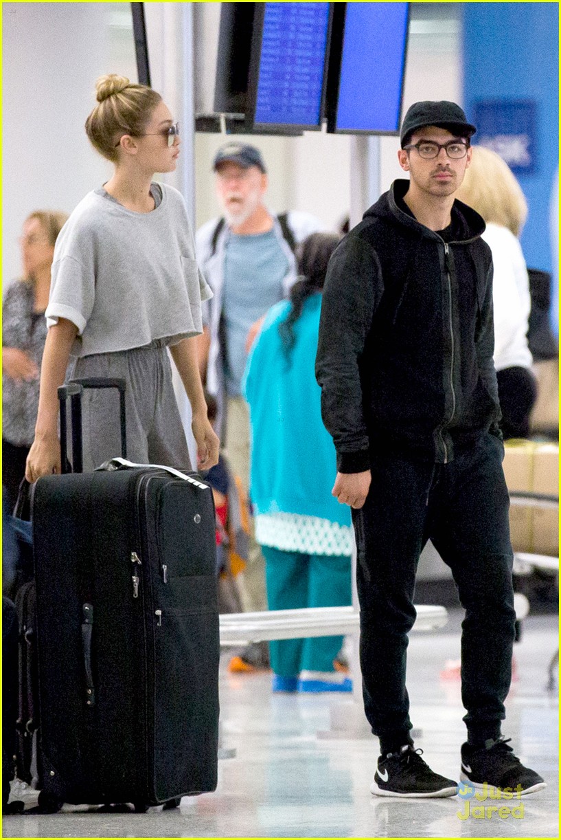 Full Sized Photo of gigi hadid joe jonas arrive jfk together workout