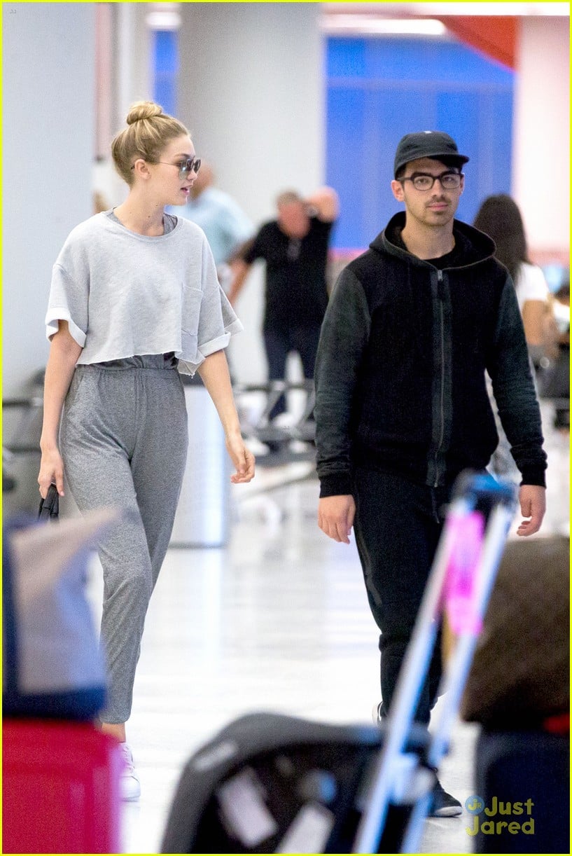 Full Sized Photo of gigi hadid joe jonas arrive jfk together workout