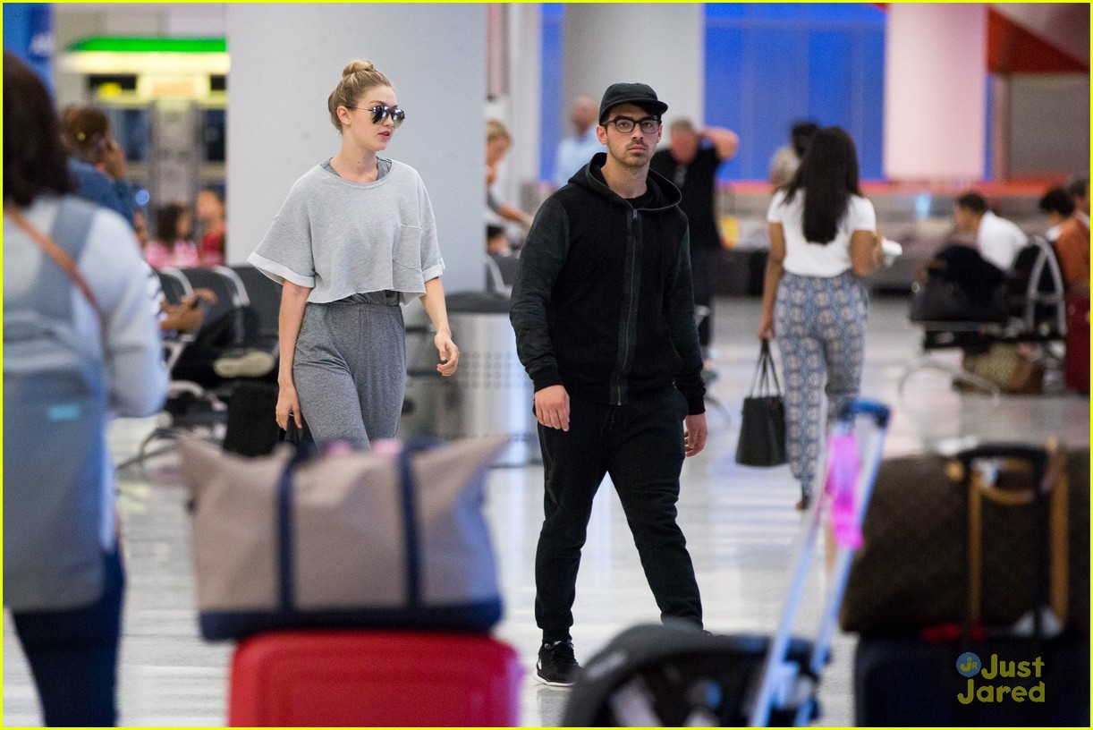 Full Sized Photo of gigi hadid joe jonas arrive jfk together workout