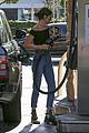 kendall jenner bares midriff in a crop top while getting gas 14