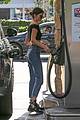 kendall jenner bares midriff in a crop top while getting gas 20