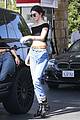 kendall jenner bares midriff in a crop top while getting gas 28