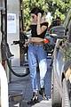 kendall jenner bares midriff in a crop top while getting gas 34