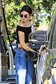 kendall jenner bares midriff in a crop top while getting gas 35