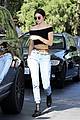 kendall jenner bares midriff in a crop top while getting gas 36