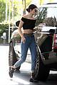 kendall jenner bares midriff in a crop top while getting gas 37