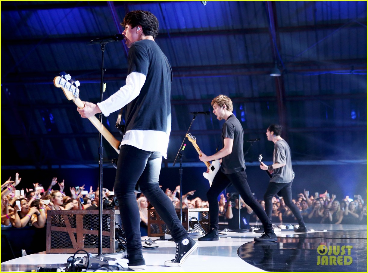 5 Seconds of Summer performing live on stage