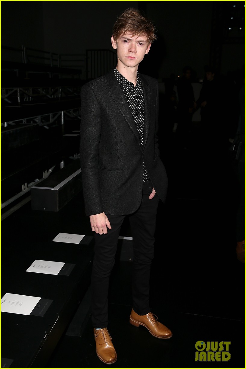 Thomas Brodie-Sangster Does a Lot of People Watching at Saint Laurent ...