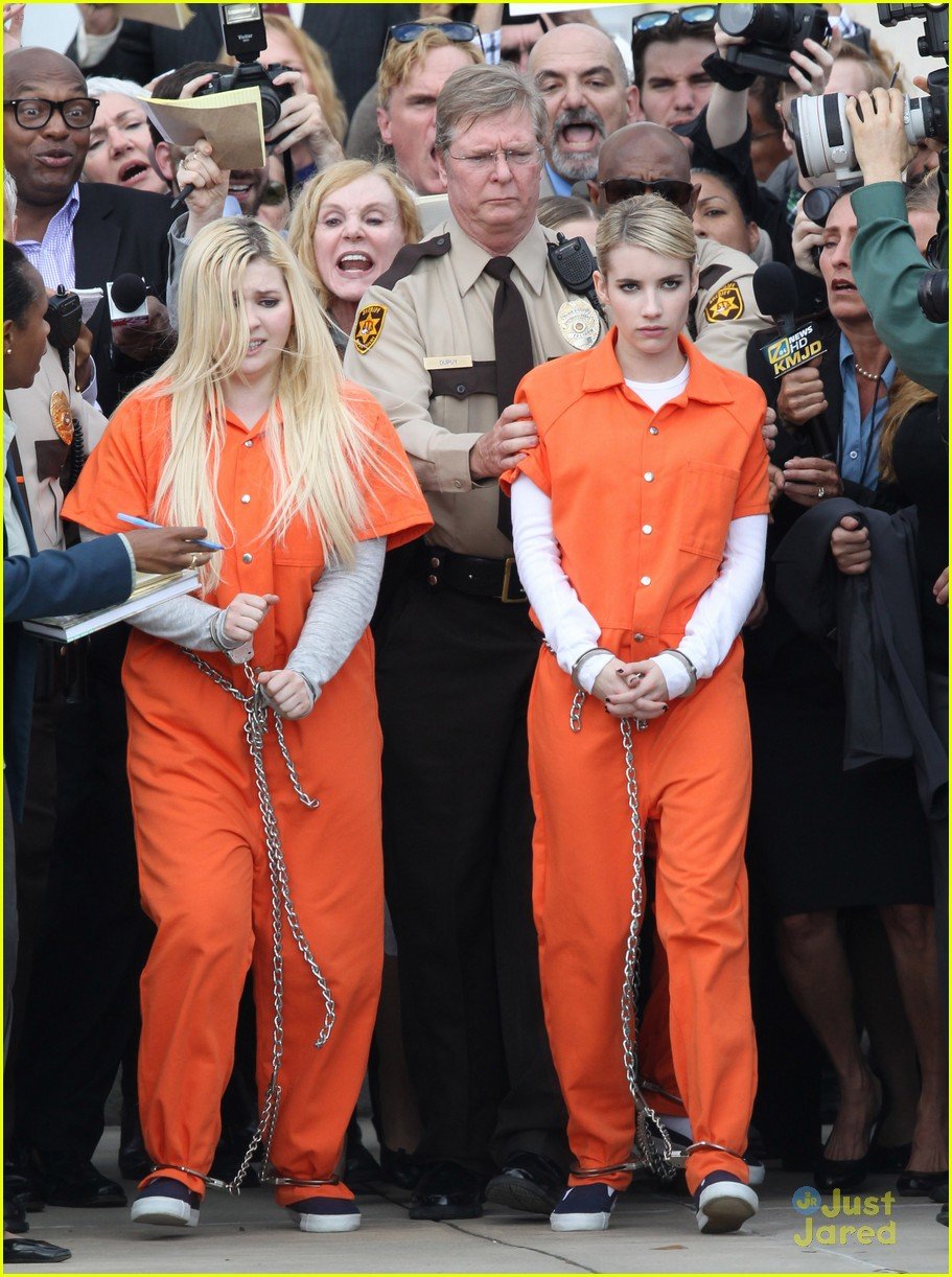 Emma Roberts & Abigail Breslin Trade In Pink Chic For Orange Jumpsuits ...