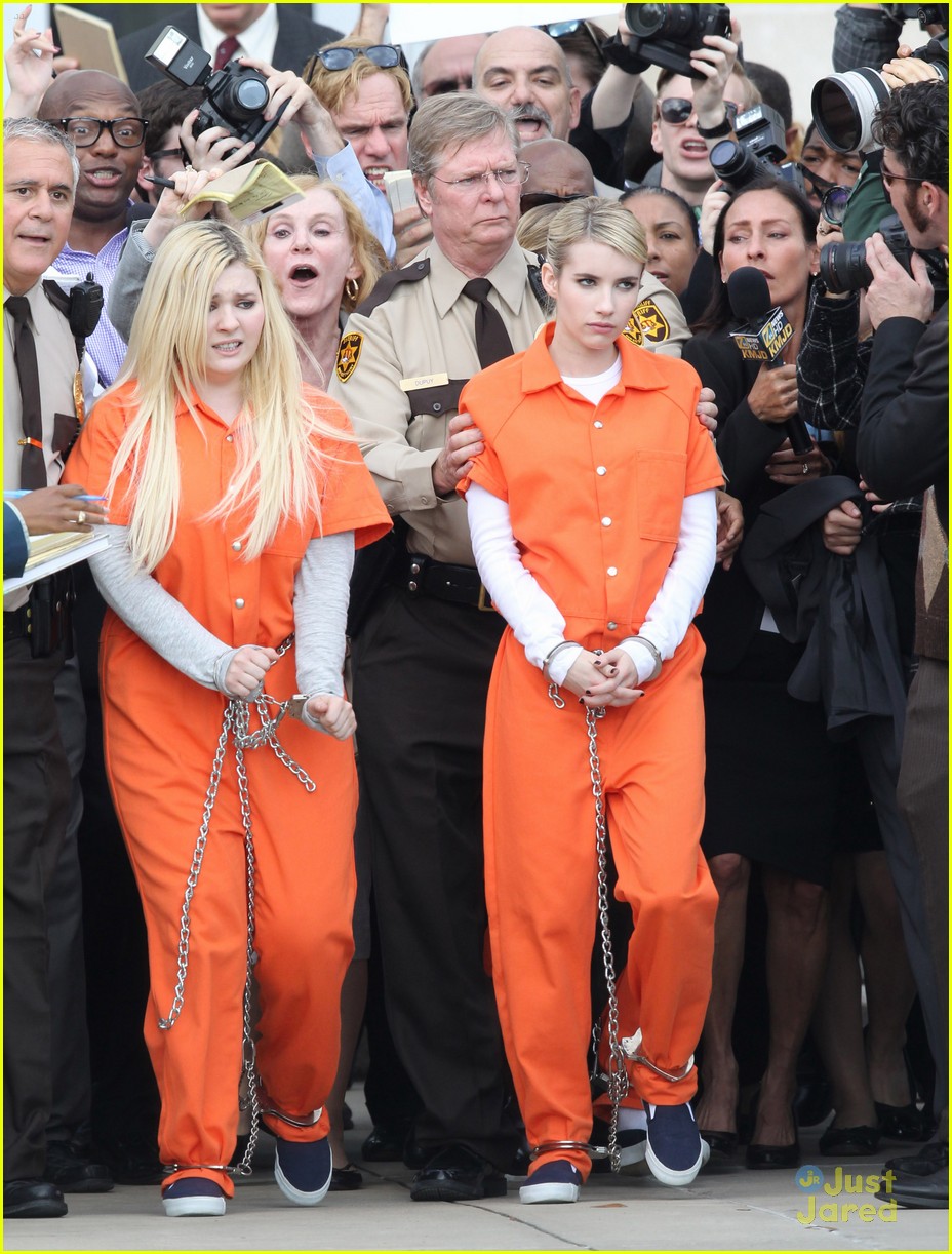 Emma Roberts & Abigail Breslin Trade In Pink Chic For Orange Jumpsuits ...